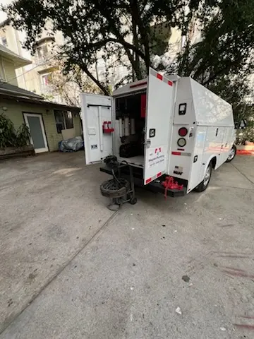 Magnet Plumbing service vehicle on-site for Water Heater Repair in Central East Austin